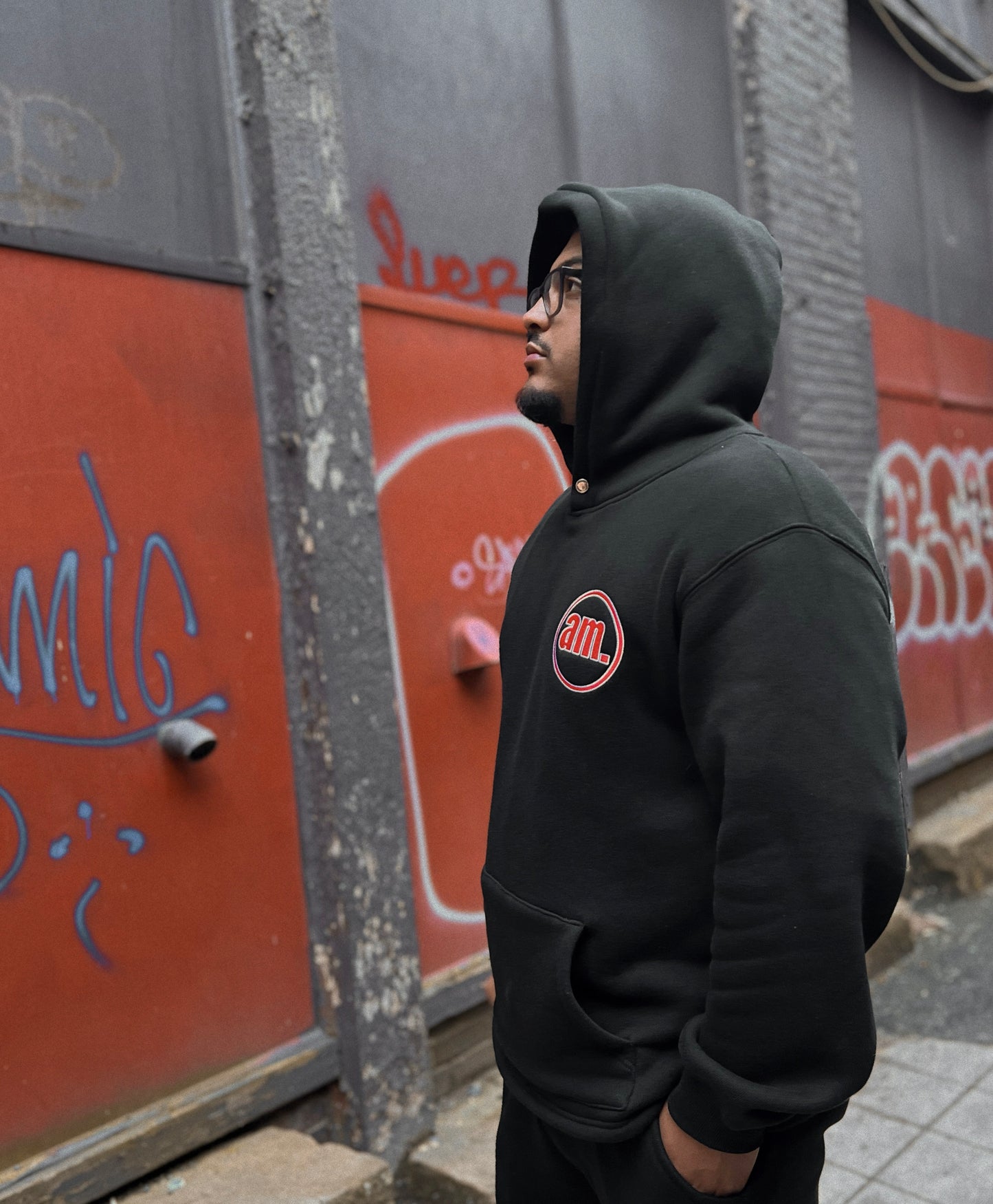 Black “am.” Embroidered Hoodie